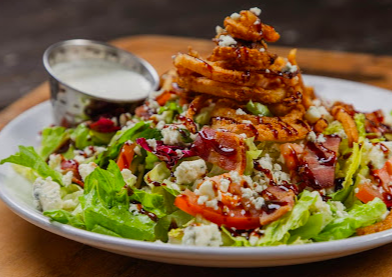 The Pub Spirits + Craft Kitchen signature dishes Asian Crunch
Maine-Style Lobster Roll
The Cheesy Quartet